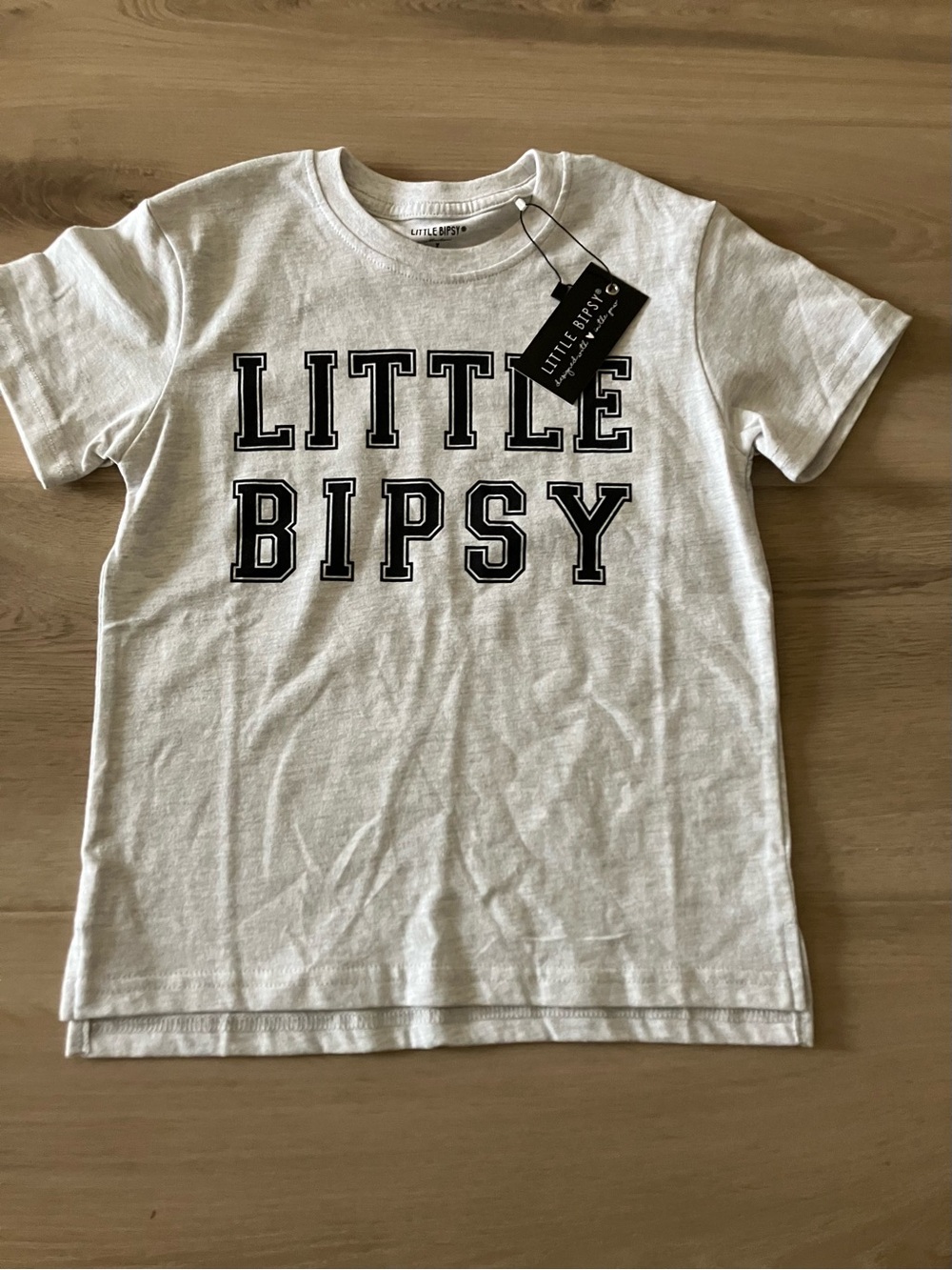 Little Bipsy grey Tee with Black Varsity Lettering. New with tags.